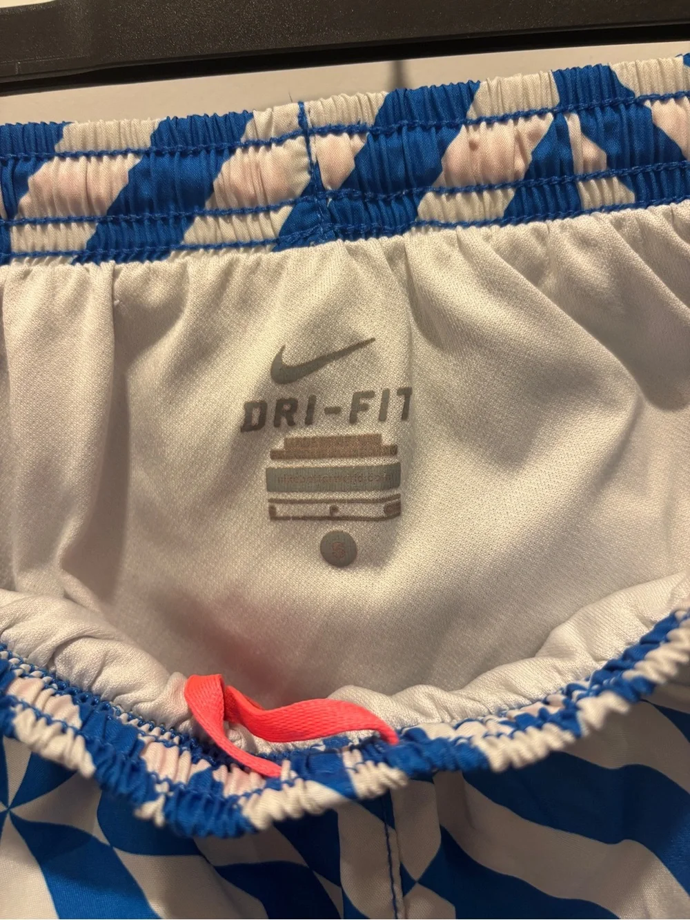 Nike Women’s Blue Geometric Athletic Shorts with Coral Trim